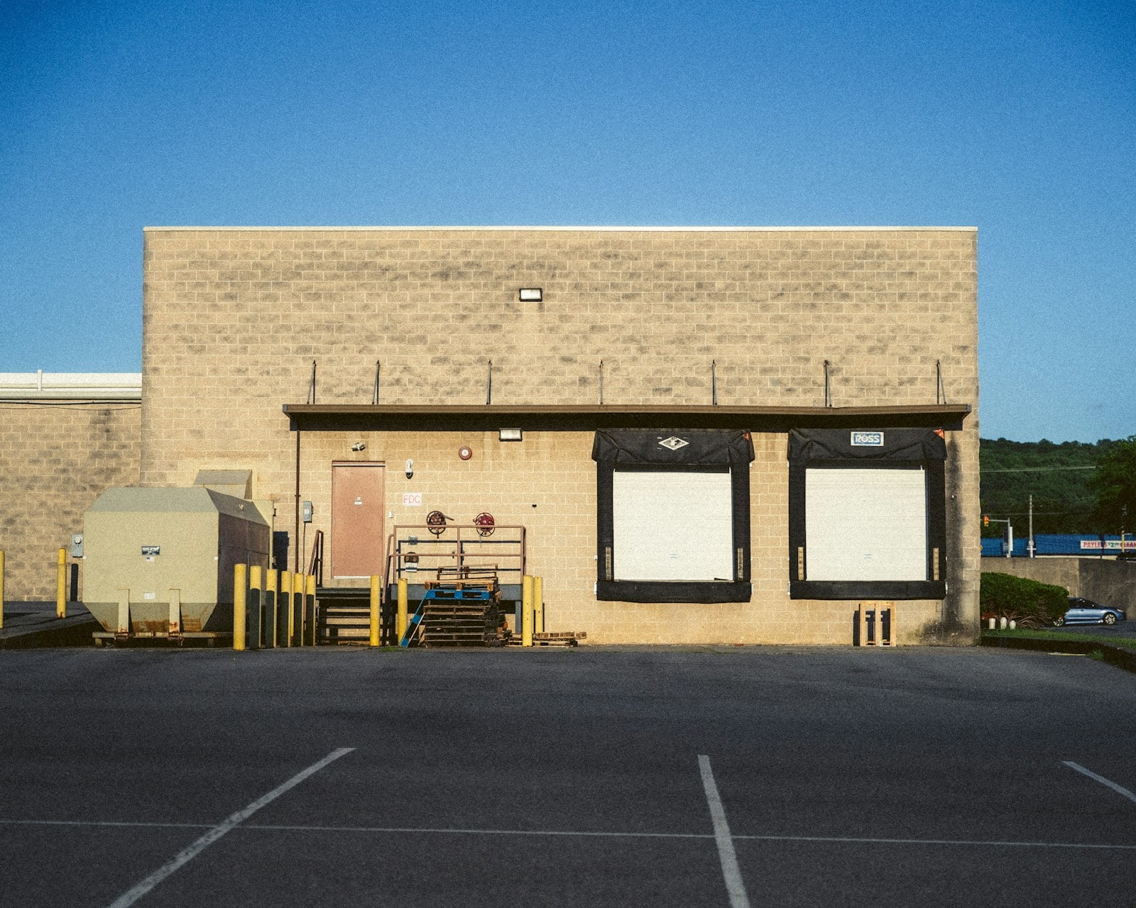 Warehouse building with two roll-up dock doors
